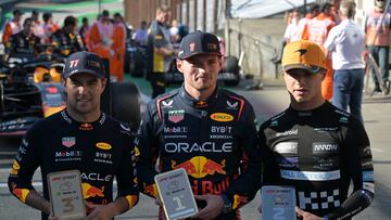 First-place Red Bull Racing's Dutch driver Max Verstappen (C) poses with second-place McLaren's British driver Lando Norris (R) and third-place Red Bull Racing's Mexican driver Sergio Perez