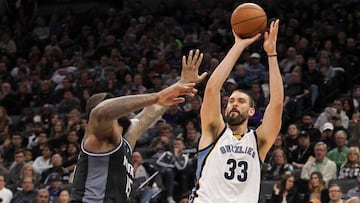 Dec 31, 2016; Sacramento, CA, USA; Memphis Grizzlies center Marc Gasol (33) shoots the ball past Sacramento Kings forward DeMarcus Cousins (15) during the second quarter at Golden 1 Center. Mandatory Credit: Sergio Estrada-USA TODAY Sports