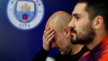 Soccer Football - Champions League - Manchester City Press Conference - Etihad Campus, Manchester, Britain - March 11, 2019 Manchester City manager Pep Guardiola and Ilkay Gundogan during a press conference Action Images via Reuters/Lee Smith