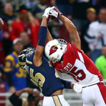 T.J. McDonalds impide una recepción de Michael Floyd.