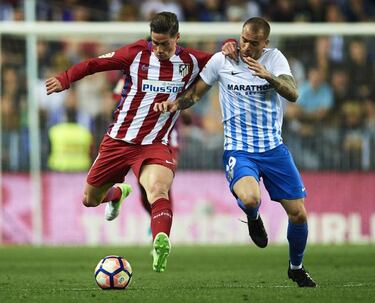 Atlético Madrid win again as Málaga relegation fears grow