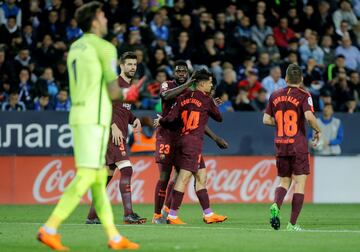 Coutinho celebrates with Umtiti after scoring.