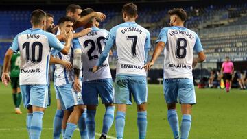 Los jugadores del M&aacute;laga, celebrando el 1-0 al Castell&oacute;n, obra de Caye.
 