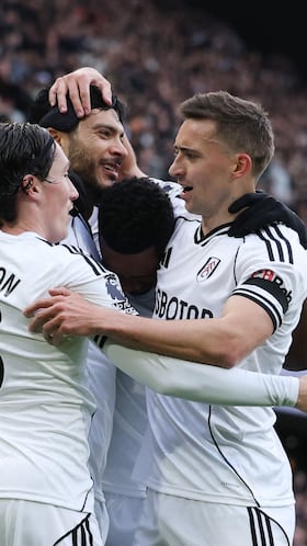 Soccer Football - Premier League - Fulham v Everton - Craven Cottage, London, Britain - February 7, 2026 Fulham's Raul Jimenez celebrates with Ryan Sessegnon, Harry Wilson and Timothy Castagne after Everton's Vitaliy Mykolenko scores an own goal and the first for Fulham REUTERS/Ian Walton EDITORIAL USE ONLY. NO USE WITH UNAUTHORIZED AUDIO, VIDEO, DATA, FIXTURE LISTS, CLUB/LEAGUE LOGOS OR 'LIVE' SERVICES. ONLINE IN-MATCH USE LIMITED TO 120 IMAGES, NO VIDEO EMULATION. NO USE IN BETTING, GAMES OR SINGLE CLUB/LEAGUE/PLAYER PUBLICATIONS. PLEASE CONTACT YOUR ACCOUNT REPRESENTATIVE FOR FURTHER DETAILS..
