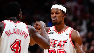 Jan 10, 2023; Miami, Florida, USA; Miami Heat forward Jimmy Butler (22) celebrates with guard Victor Oladipo (4) after scoring against the Oklahoma City Thunder during the fourth quarter at FTX Arena. Mandatory Credit: Rich Storry-USA TODAY Sports