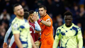 Soccer Football - Premier League - Aston Villa v Leeds United - Villa Park, Birmingham, Britain - January 13, 2023 Aston Villa's Emiliano Martinez reacts after saving a shot from Leeds United's Jack Harrison Action Images via Reuters/Andrew Boyers EDITORIAL USE ONLY. No use with unauthorized audio, video, data, fixture lists, club/league logos or 'live' services. Online in-match use limited to 75 images, no video emulation. No use in betting, games or single club /league/player publications.  Please contact your account representative for further details.