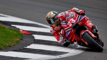 Ducati Lenovo Team's Italian rider Enea Bastianini takes part in a warm-up ahead of the MotoGP race of British Grand Prix at Silverstone circuit in Northamptonshire, central England, on August 4, 2024. (Photo by BENJAMIN CREMEL / AFP)