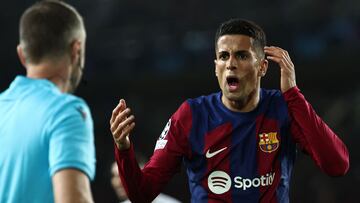 Barcelona's Portuguese defender #02 Joao Cancelo reacts during the UEFA Champions League quarter-final second leg football match between FC Barcelona and Paris SG at the Estadi Olimpic Lluis Companys in Barcelona on April 16, 2024. (Photo by FRANCK FIFE / AFP)