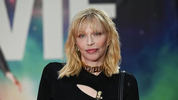 Former Hole singer Courtney Love says she’s staying put in the U.K., describing the U.S. as “frightening now”.