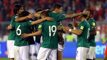 Football Soccer - Bolivia v Chile - World Cup 2018 Qualifier - Monumental Stadium Santiago, Chile - 06/09/16. Bolivia&#039;s players embrace at the end of the match. REUTERS/Ivan Alvarado