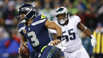 SEATTLE, WA - DECEMBER 03: Quarterback Russell Wilson #3 of the Seattle Seahawks rushes against the Philadelphia Eagles in the third quarter at CenturyLink Field on December 3, 2017 in Seattle, Washington. Otto Greule Jr /Getty Images/AFP
== FOR NEWSPAPERS, INTERNET, TELCOS & TELEVISION USE ONLY ==