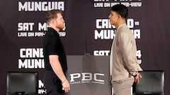 BEVERLY HILLS, CALIFORNIA - MARCH 19: Canelo Alvarez and Jaime Munguia face off during a news conference to preview their super middleweight fight at The Beverly Hills Hotel on March 19, 2024 in Beverly Hills, California.   Katelyn Mulcahy/Getty Images/AFP (Photo by Katelyn Mulcahy / GETTY IMAGES NORTH AMERICA / Getty Images via AFP)