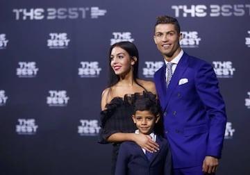 Real Madrid's Cristiano Ronaldo, his son Cristiano Ronaldo Jr and Georgina Rodriguez arrive at the ceremony.