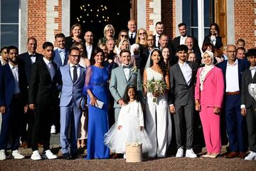 New cycling world champion Belgium's Remco Evenepoel (C) and Oumaima Oumi Rayane (C-R)  pose for a group picture with their families after their wedding, in Dilbeek, on October 7, 2022. - Belgium OUT (Photo by JASPER JACOBS / Belga / AFP) / Belgium OUT (Photo by JASPER JACOBS/Belga/AFP via Getty Images)