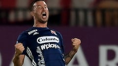 Independiente Medellin's Argentine Luciano Pons celebrates after scoring against America de Cali during the Sudamericana Cup first round second leg all-Colombian football match at the Pascual Guerrero stadium in Cali, Colombia, on March 16, 2022. (Photo by Luis ROBAYO / AFP)