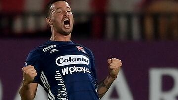 Independiente Medellin's Argentine Luciano Pons celebrates after scoring against America de Cali during the Sudamericana Cup first round second leg all-Colombian football match at the Pascual Guerrero stadium in Cali, Colombia, on March 16, 2022. (Photo by Luis ROBAYO / AFP)