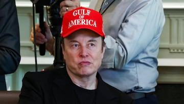 a CEO Elon Musk wears a cap with the words "Gulf of America" as he attends a cabinet meeting held by U.S. President Donald Trump at the White House in Washington, D.C., U.S., April 30, 2025. REUTERS/Evelyn Hockstein