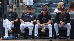 Mar 18, 2024; Tampa, Florida, USA;  New York Yankees manger Aaron Boone (17) (left) former manager Joe Torre (left center), bench coach Brad Ausmus (68) (right center) and major league field coordinator Tanner Swanson (76) (right) look on during a spring training game against the Philadelphia Phillies at George M. Steinbrenner Field. Mandatory Credit: Nathan Ray Seebeck-USA TODAY Sports