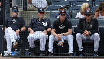 Mar 18, 2024; Tampa, Florida, USA;  New York Yankees manger Aaron Boone (17) (left) former manager Joe Torre (left center), bench coach Brad Ausmus (68) (right center) and major league field coordinator Tanner Swanson (76) (right) look on during a spring training game against the Philadelphia Phillies at George M. Steinbrenner Field. Mandatory Credit: Nathan Ray Seebeck-USA TODAY Sports