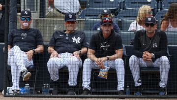 Mar 18, 2024; Tampa, Florida, USA; New York Yankees manger Aaron Boone (17) (left) former manager Joe Torre (left center), bench coach Brad Ausmus (68) (right center) and major league field coordinator Tanner Swanson (76) (right) look on during a spring training game against the Philadelphia Phillies at George M. Steinbrenner Field. Mandatory Credit: Nathan Ray Seebeck-USA TODAY Sports