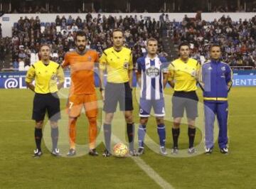 El árbitro Melero López acompañado por sus asistentes Torre Cimiano y Martínez Serrato, el cuarto árbitro Benjumea Álvarez y los capitanes Negredo y Bergantiños.
