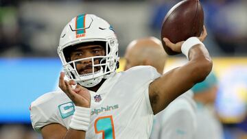 INGLEWOOD, CALIFORNIA - DECEMBER 11: Tua Tagovailoa #1 of the Miami Dolphins warms up during a game against the Los Angeles Chargers at SoFi Stadium on December 11, 2022 in Inglewood, California.   Harry How/Getty Images/AFP (Photo by Harry How / GETTY IMAGES NORTH AMERICA / Getty Images via AFP)