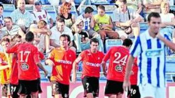 <b>REACCIÓN. </b>Los jugadores del Celta celebran el tanto del empate que les dio alas para pensar en la remontada.