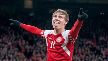 Denmark's forward Rasmus Hojlund celebrates scoring the 2-1 goal during the UEFA Euro 2024 Group H qualification football match Denmark v Finland on March 23, 2023 in Copenhagen, Denmark. (Photo by Liselotte Sabroe / Ritzau Scanpix / AFP) / Denmark OUT