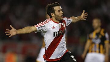 FILE - In this April 6, 2016 file photo, Camilo Mayada of Argentina's River Plate celebrates scoring against Bolivia's The Strongest during a Copa Libertadores soccer match in Buenos Aires, Argentina. River Plate was involved on Thursday in a doping scandal after confirming that two of its players consumed banned substances detected in the doping tests conducted during the first round of the Copa Libertadores. The club confirmed Mayada failed a doping test taken on May 18, 2017. (AP Photo/Natacha Pisarenko, File)