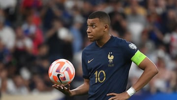 France's forward Kylian Mbappe looks on before taking a penalty shot during the UEFA Euro 2024 group B qualification football match between France and Greece at the Stade de France in Saint-Denis, in the northern outskirts of Paris, on June 19, 2023. (Photo by FRANCK FIFE / AFP)