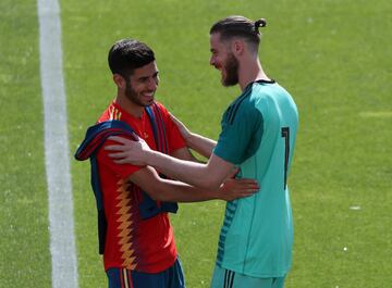 Marco Asensio and David de Gea.