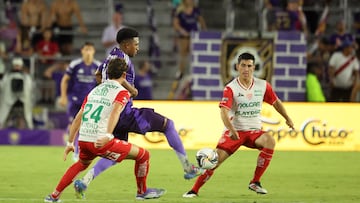 Aug 6, 2025; Orlando, FL, USA; Orlando City defender Alex Freeman (30) defends the ball as Club Necaxa defender Franco Rossano (24) defends during the second half at Inter&Co Stadium. Mandatory Credit: Kim Klement Neitzel-Imagn Images