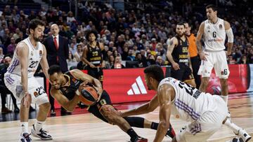 MADRID, SPAIN - DECEMBER 08: Elie Okobo, #0 of AS Monaco competes with Sergio Llull, #23 of Real Madrid and Walter Tavares, #22 during the 2022-23 Turkish Airlines EuroLeague Regular Season Round 12 game between Real Madrid and AS Monaco at Wizink Center on December 08, 2022 in Madrid, Spain. (Photo by Sergio Sanz/Euroleague Basketball via Getty Images)