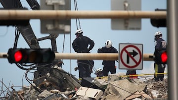 Rescue personnel continues search and rescue operations for survivors of a partially collapsed residential building in Surfside, near Miami Beach, Florida, U.S. June 26, 2021. REUTERS/Marco Bello