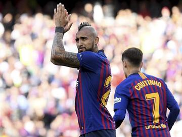 Mixed reaction | Arturo Vidal celebrates his goal against Getafe while Coutinho jogs off.