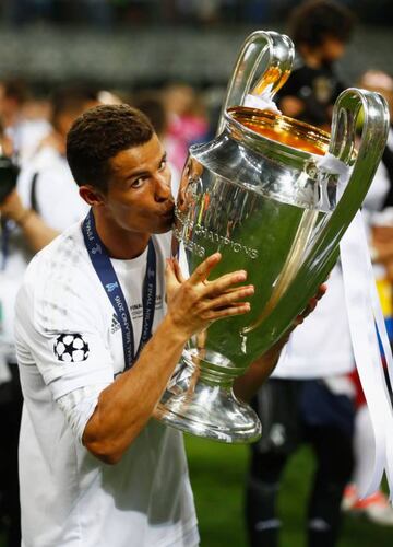 Cristiano Ronaldo of Real Madrid kisses the Champions League trophy after the UEFA Champions League Final match between Real Madrid and Club Atletico de Madrid