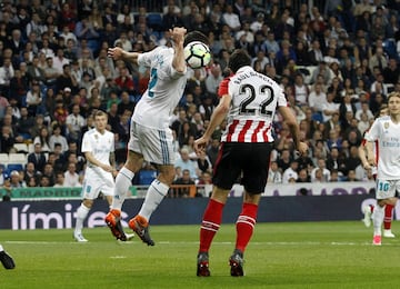 Raúl García heads the ball inside the box and it hits Carvajal's hand. The referee doesn't give the penalty.