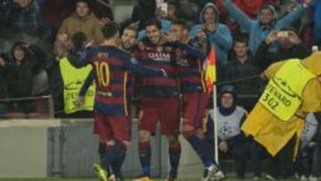 Messi, Suárez, Neymar y Jordi Alba, celebrando un gol contra el Arsenal en la Champions League.