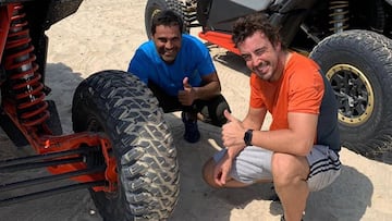 Fernando Alonso con Nasser Al-Attiyah.