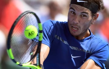 Rafael Nadal of Spain hits a backhand return against Richard Gasquet of France during the Kooyong Classic tennis tournament in Melbourne.