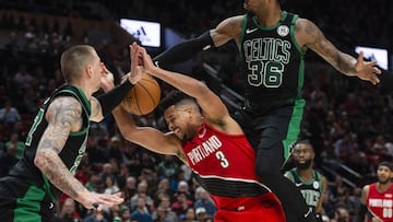 CJ McCollum deja de firmar autógrafos por el coronavirus