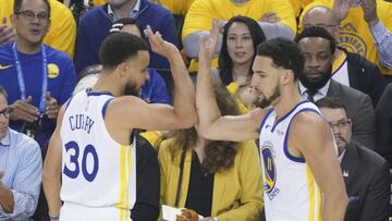 May 14, 2019; Oakland, CA, USA; Golden State Warriors guard Stephen Curry (30) is congratulated by guard Klay Thompson (11) against the Portland Trail Blazers during the first quarter in game one of the Western conference finals of the 2019 NBA Playoffs at Oracle Arena. Mandatory Credit: Kyle Terada-USA TODAY Sports