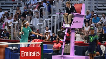 Jul 30, 2025; Toronto, ON, Canada; Stefanos Tsitsipas (GRE) disputes a line call with the umpire during second round play against Christopher O'Connell (AUS) at Sobeys Stadium. Mandatory Credit: Dan Hamilton-Imagn Images