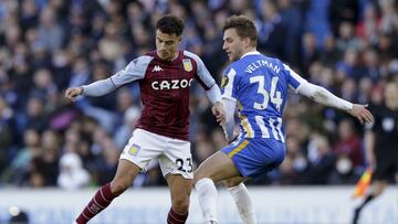BRIGHTON, ENGLAND - FEBRUARY 26: Philippe Coutinho of Aston Villa is challenged by Joel Veltman of Brighton &amp; Hove Albion during the Premier League match between Brighton &amp; Hove Albion and Aston Villa at American Express Community Stadium on Febru
