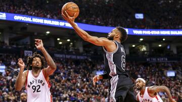 Jan 24, 2017; Toronto, Ontario, CAN; San Antonio Spurs guard Patty Mills (8) shoots the ball in front of Toronto Raptors center Lucas Nogueira (92) in the second half at Air Canada Centre. The Spurs won 108-106. Mandatory Credit: Kevin Sousa-USA TODAY Sports