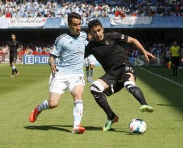 El jugador del Celta de Vigo Hugo Mayo, y José Ángel, de la Real Sociedad disputan el balón durante el partido que ambos equipos disputaron hoy correspondiente a la trigésimo tercera jornada de Liga BBVA en el estadio Balaidos de Vigo.