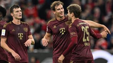 Bayern Munich's French defender Benjamin Pavard (L), Bayern Munich's German midfielder Leon Goretzka (C) and Bayern Munich's German forward Thomas Mueller celebrate during the German first division Bundesliga football match between FC Bayern Munich and Bayer 04 Leverkusen in Munich on September 30, 2022. - DFL REGULATIONS PROHIBIT ANY USE OF PHOTOGRAPHS AS IMAGE SEQUENCES AND/OR QUASI-VIDEO (Photo by CHRISTOF STACHE / AFP) / DFL REGULATIONS PROHIBIT ANY USE OF PHOTOGRAPHS AS IMAGE SEQUENCES AND/OR QUASI-VIDEO (Photo by CHRISTOF STACHE/AFP via Getty Images)
