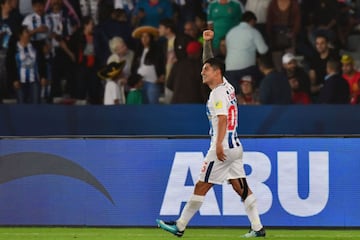 CF Pachuca's Mexican midfielder Victor Guzman celebrates after scoring a goal against Wydad Casablanca during their FIFA Club World Cup quarter-final match Zayed Sports City Stadium in the Emirati capital Abu Dhabi on December 9, 2017. / AFP PHOTO / GIUSEPPE CACACE