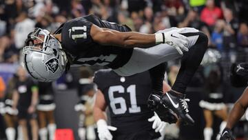 LAS VEGAS, NEVADA - DECEMBER 14: Wide receiver Tre Tucker #11 of the Las Vegas Raiders celebrates after catching a pass for touchdown against the Los Angeles Chargers during the first quarter at Allegiant Stadium on December 14, 2023 in Las Vegas, Nevada.   Ethan Miller/Getty Images/AFP (Photo by Ethan Miller / GETTY IMAGES NORTH AMERICA / Getty Images via AFP)