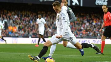 Valencia's Russian midfielder Denis Cheryshev controls the ball during the Spanish league football match Valencia CF against Real Sociedad at the Mestalla stadium in Valencia on February 10, 2019. (Photo by JOSE JORDAN / AFP)